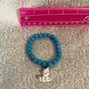 Blue beaded bracket with zebra charm